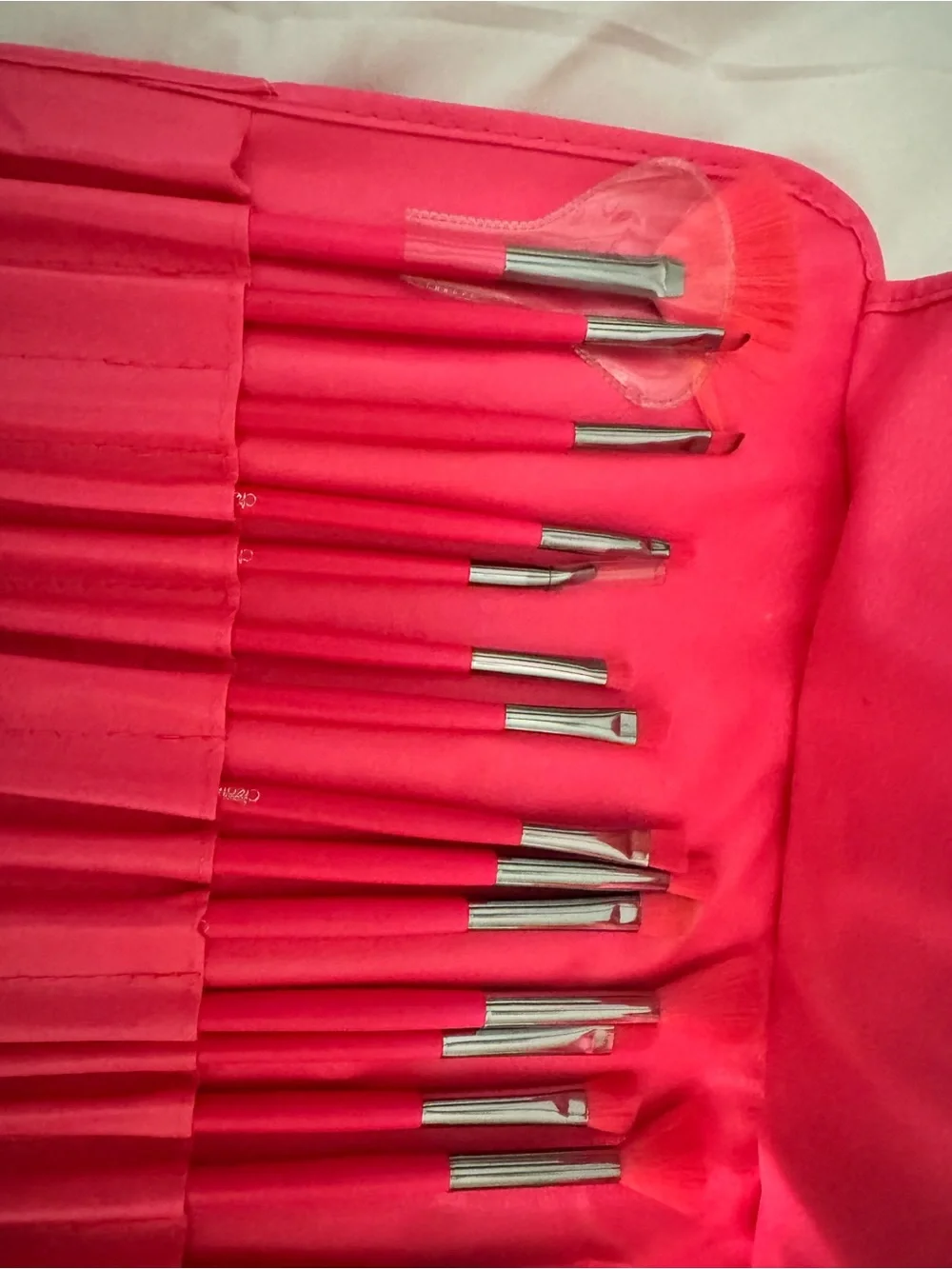 Hot pink Beauty creations makeup brushes